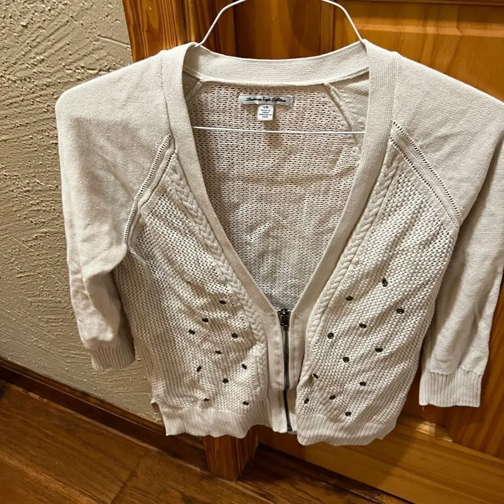 American Eagle zip up cream colored sweater size large